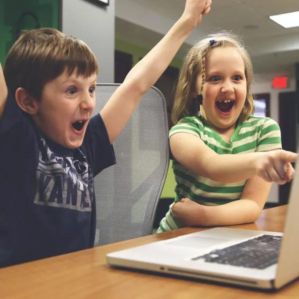 children-excited-on-computer