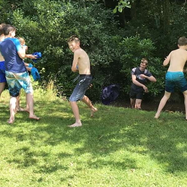 Guests having a water fight