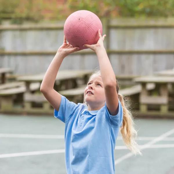 Girl playing netball