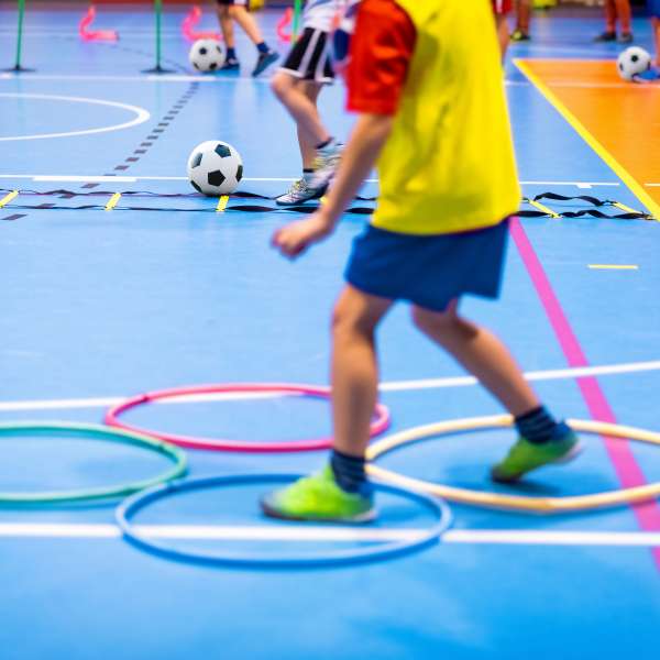 children completing obstacle course