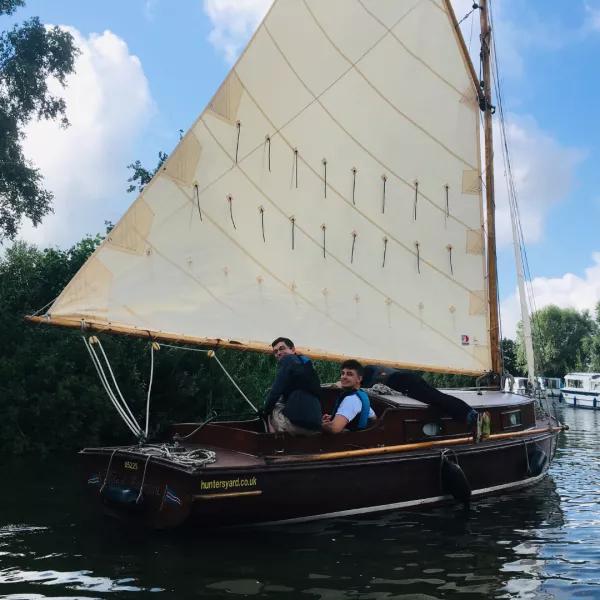 Two boys on sailing boat