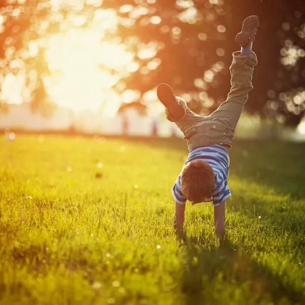 Boy doing cartwheel
