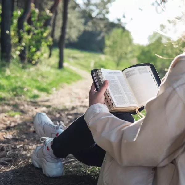 teenager reading Bible