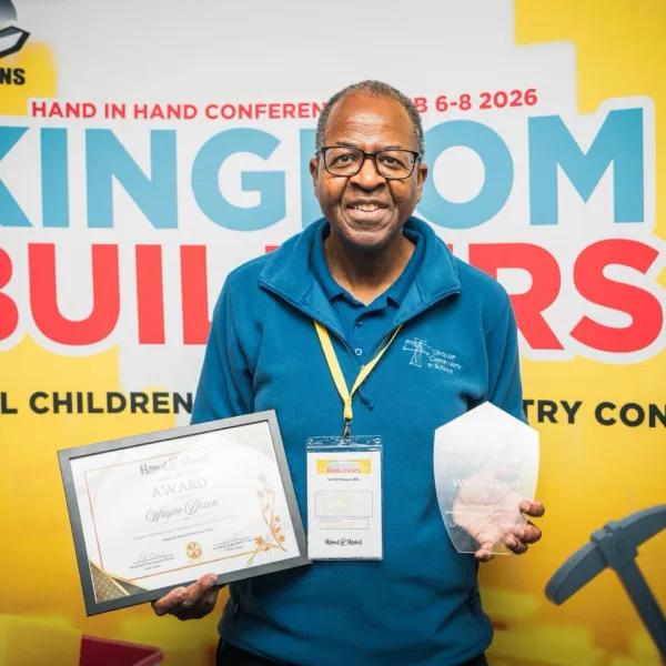 Wayne Dixon with long service award