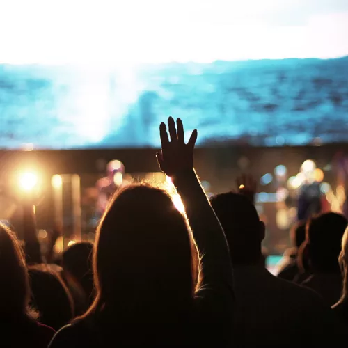 Young people worshipping
