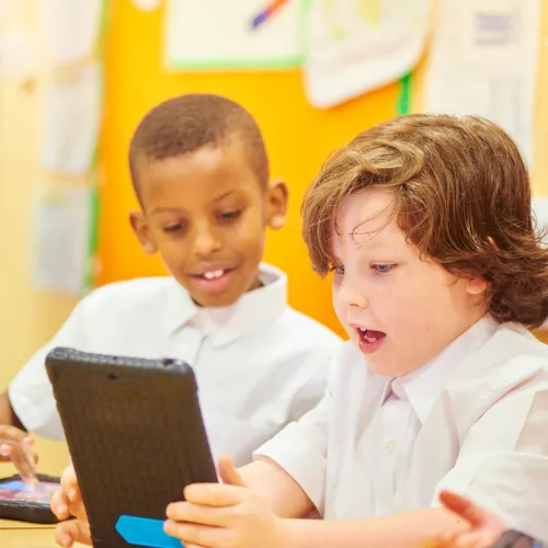 Children on tablet at school