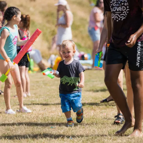 child with water gun