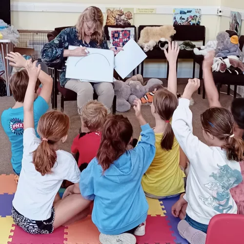 Group of children listening to a story