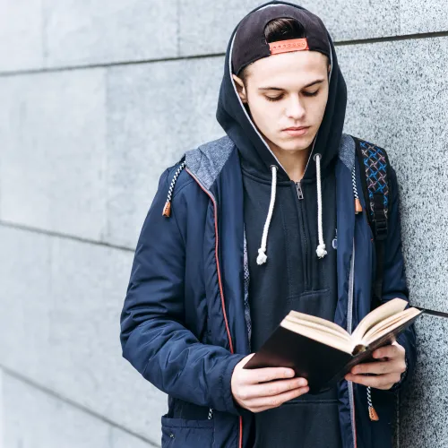 Young person reading the Bible